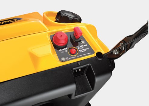 pushing the trigger control for the snow blower power steering